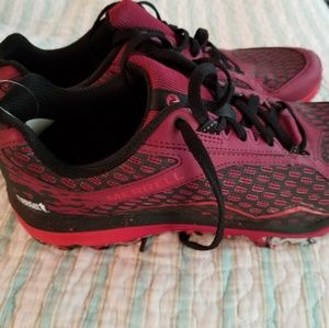 Merrell trail running shoes.